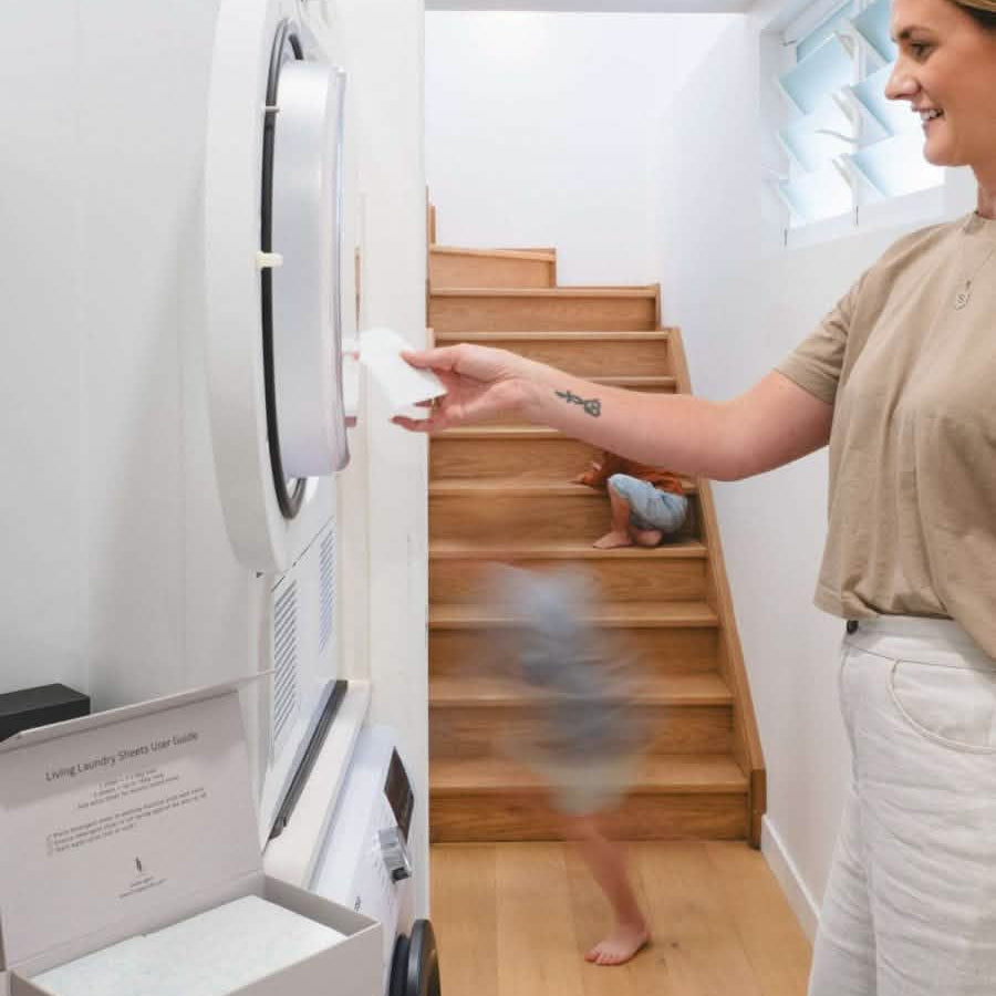 value pack of unscented detergent sheets busy mum in background