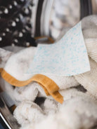 unscented and sensitive laundry sheet in machine with towels